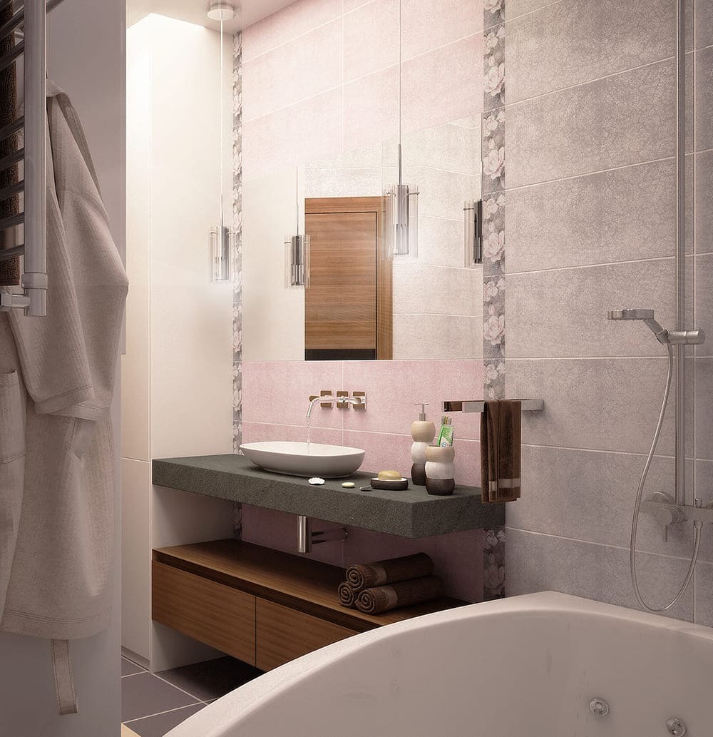 Современный дизайн ванной комнаты с розовой плиткой, подвесной тумбой, круглой раковиной и душевой зоной &mdash; проект студии Goldiz