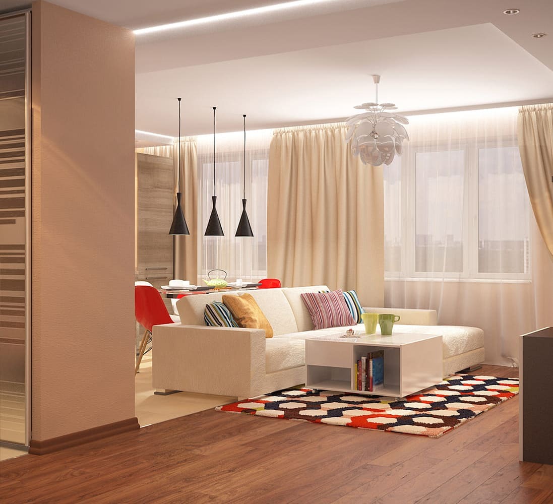 Светлая кухня-гостиная с подвесными светильниками, яркими акцентами и мягкой зоной отдыха